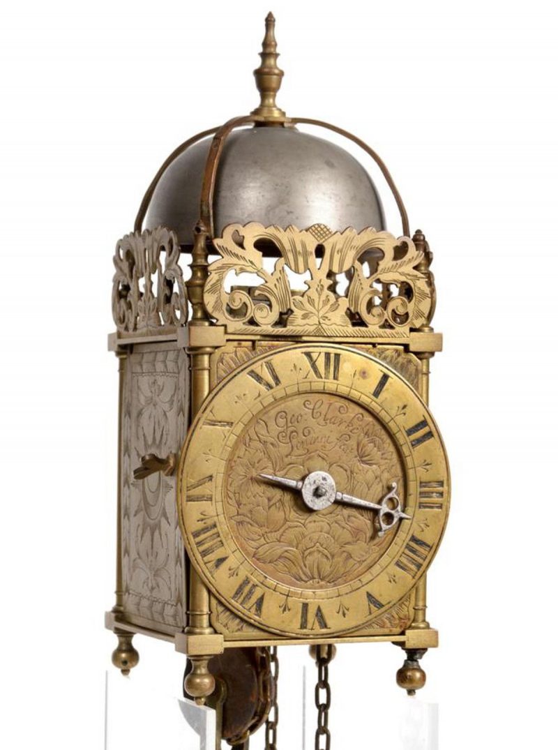 A Small Brass Hook and Spike Lantern Striking Wall Clock, signed Geo Clarke, Londini Fecit, circa 1760 - featured collectibles
