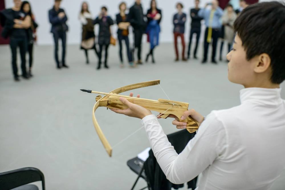 Performance Zejing Liu, Festiwal Performance Platform Lublin 2014, Lublin, 18.10.2014 r., fot. Wojciech Pacewicz (źródło: dzięki uprzejmości Galerii Labirynt)