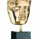 Nagroda BAFTA, projekt statuetki: Mitzi Cunliffe (źródło: Wikipedia. Na licencji Creative Commons)