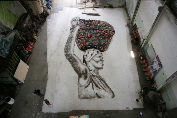 VIEW DOWN ONTO IRMA'S PORTAIT ON THE FLOOR Photograph by Vik Muniz, courtesy of Vik Muniz Studio STILL